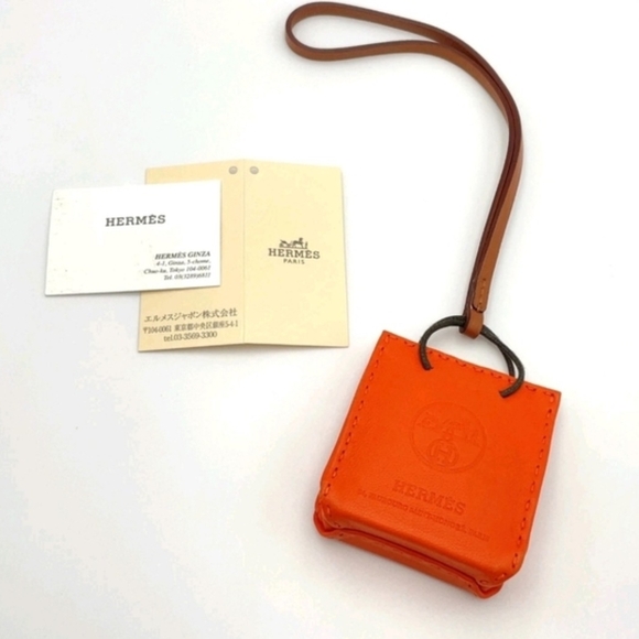 HERMÈS ORANGE LEATHER MINI POUCH BAG CHARM KEY HOLDER + BOX - Picture 2 of 12